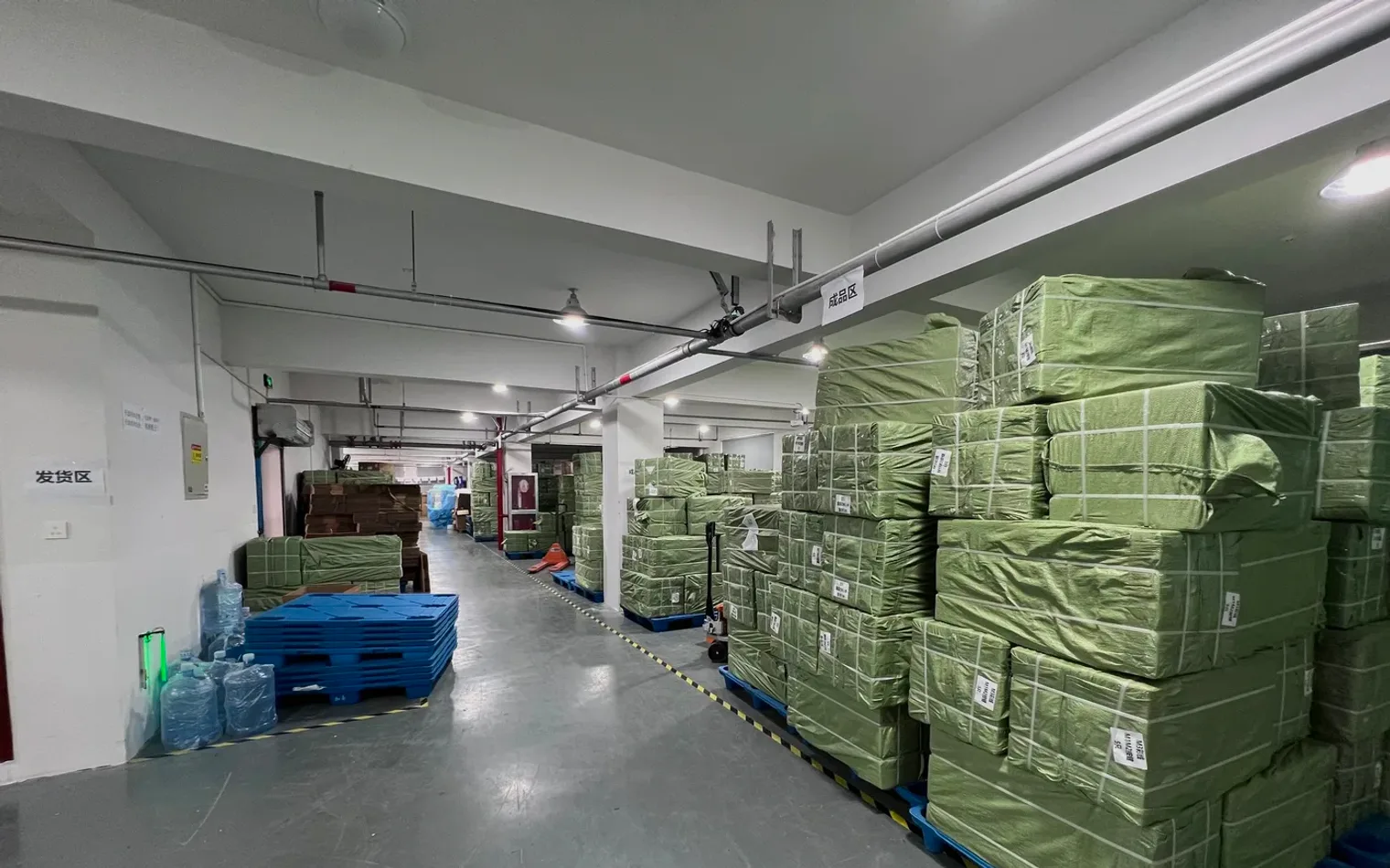 Shipping area with pallets of packed orders ready for worldwide dispatch